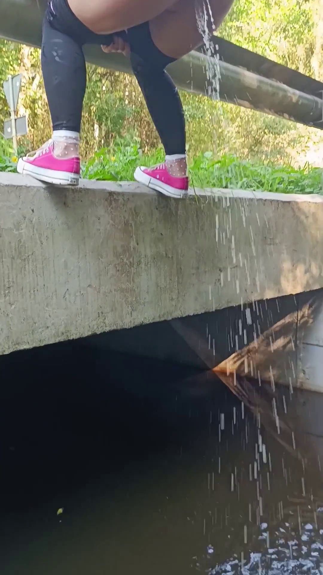 Pee from a small bridge