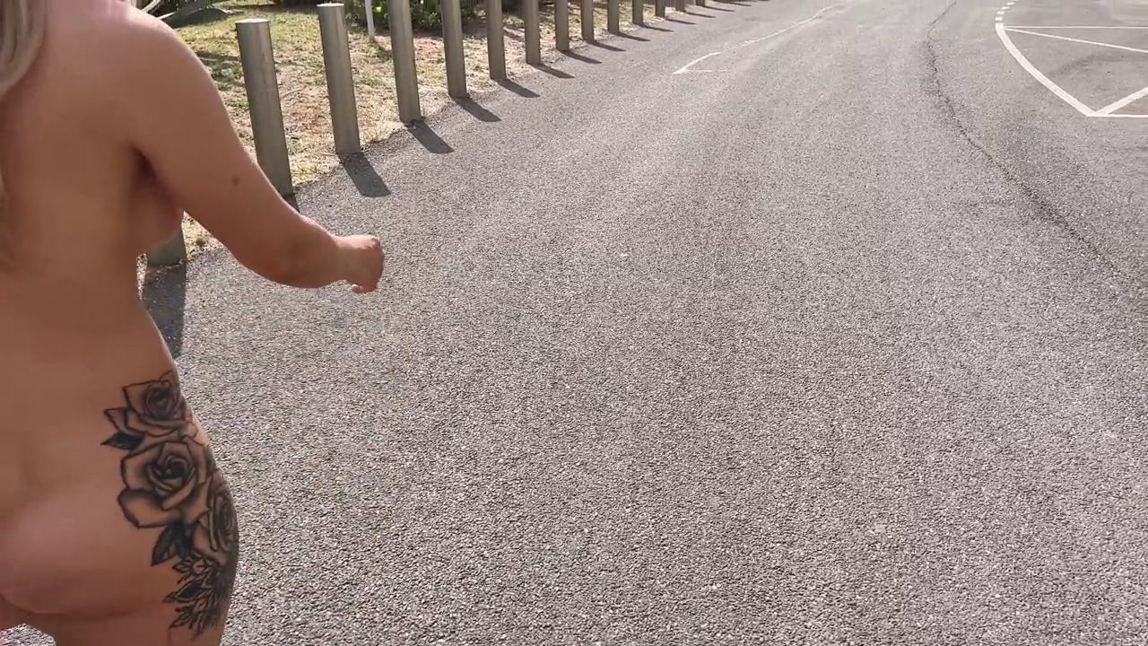 She walks completely naked on the street and on the beach